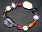 Armband mit lila, beigen, creme und Metall-Perlen